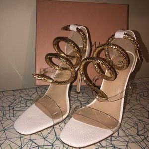 Brand new snake heels